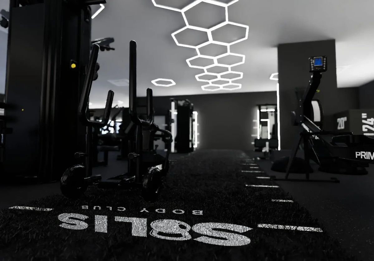 The sled on the training turf at Solis Body Club, where HYROX classes train